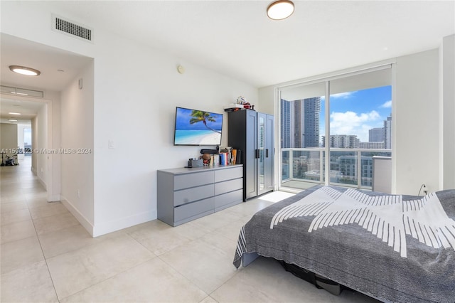 bedroom with expansive windows