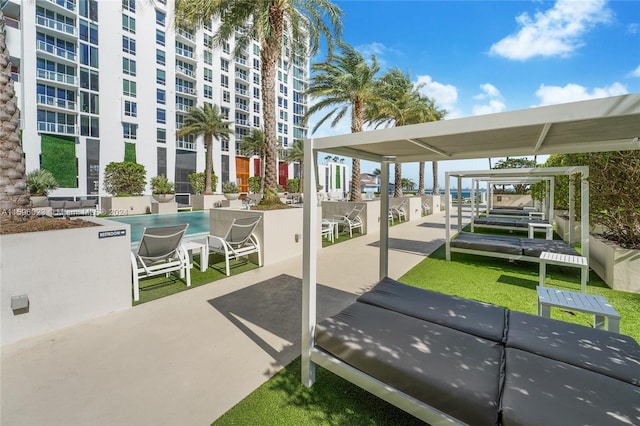 view of patio with a community pool