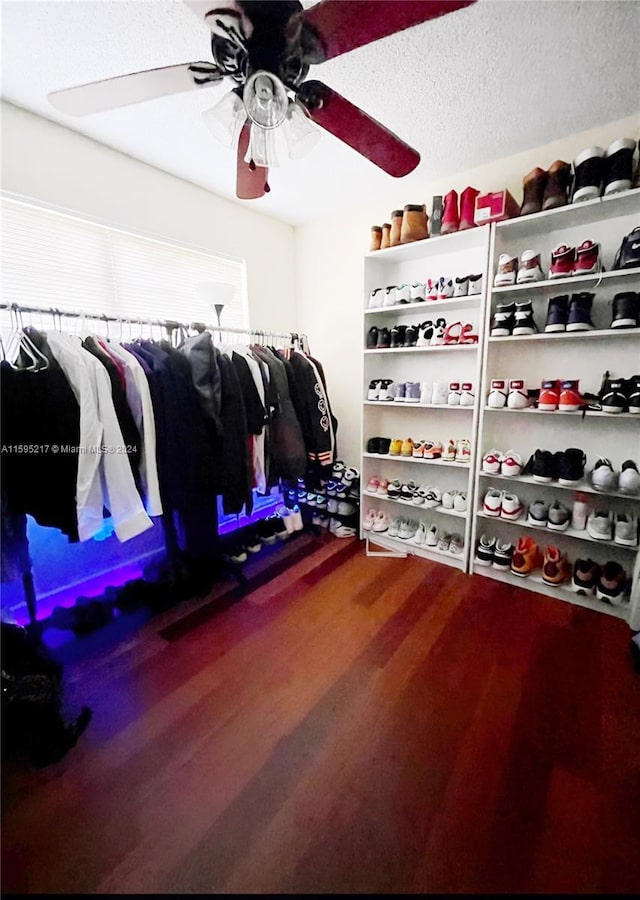 spacious closet featuring ceiling fan and hardwood / wood-style floors