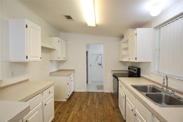 kitchen with electric stove, sink, lofted ceiling, white cabinets, and dark hardwood / wood-style flooring