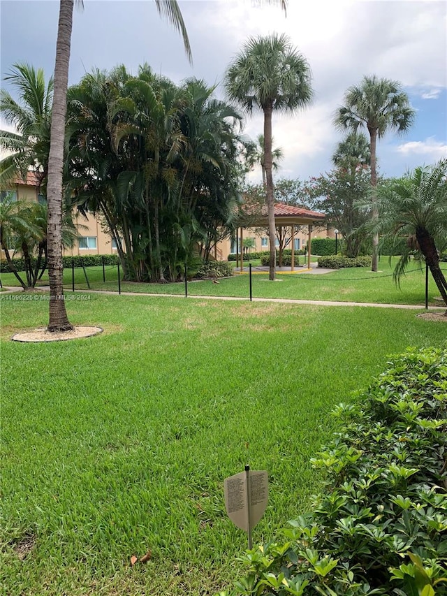 view of home's community featuring a gazebo and a yard