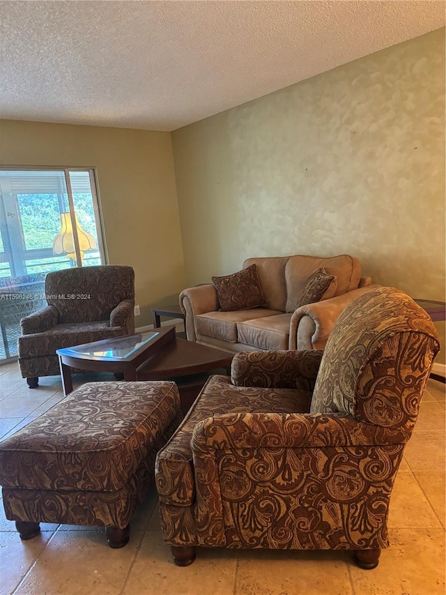 living room with a textured ceiling