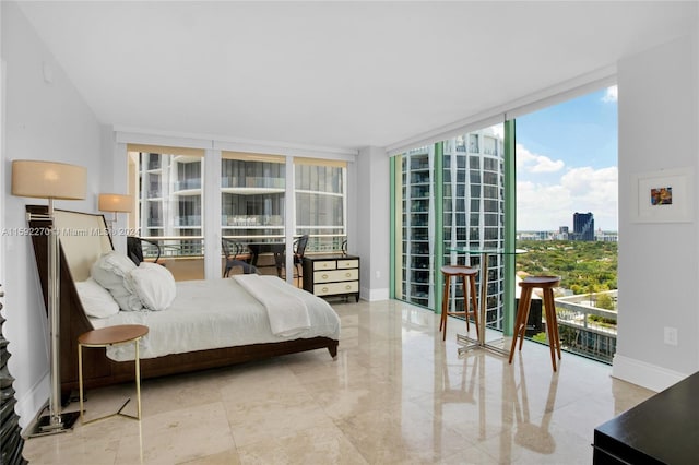 bedroom with a wall of windows