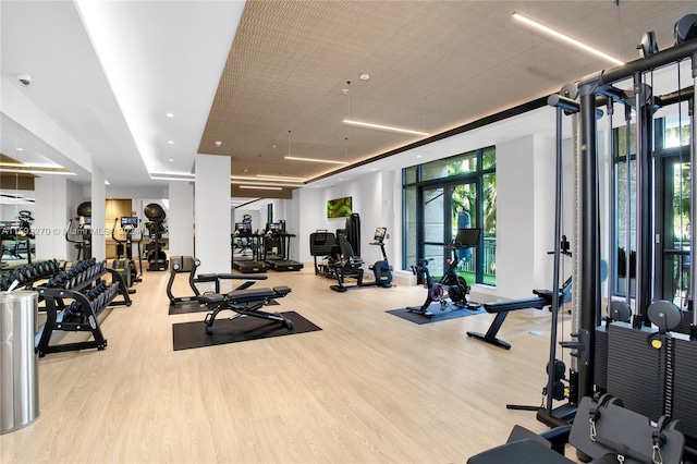 gym featuring light hardwood / wood-style flooring