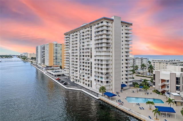 outdoor building at dusk with a water view