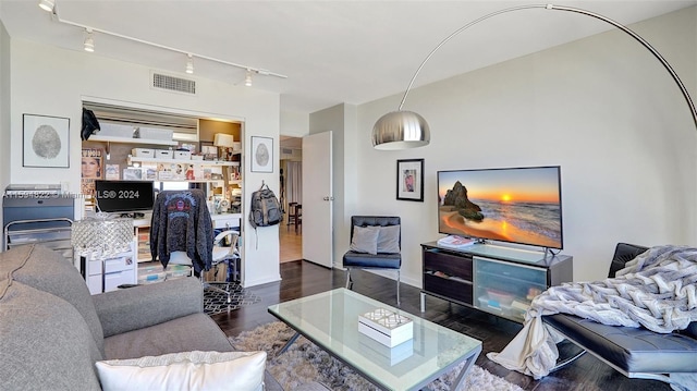 living room with dark hardwood / wood-style floors