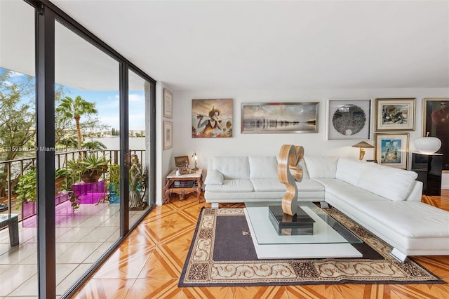 living room with a wall of windows