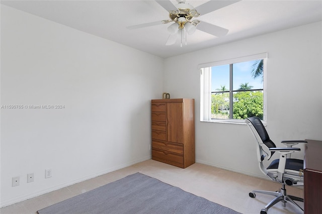 office featuring light colored carpet and ceiling fan