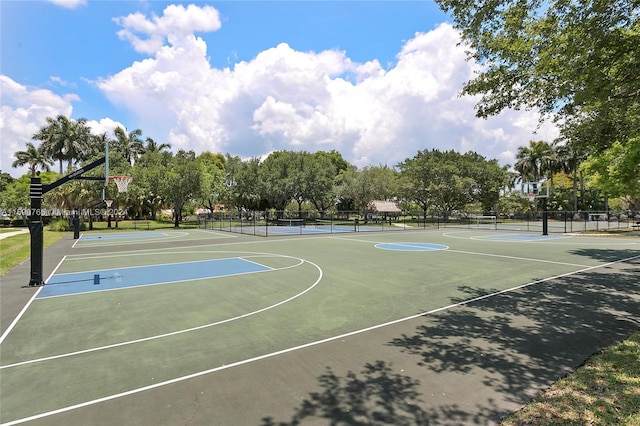 view of sport court featuring tennis court