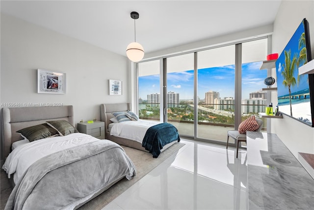 bedroom featuring access to outside and tile flooring