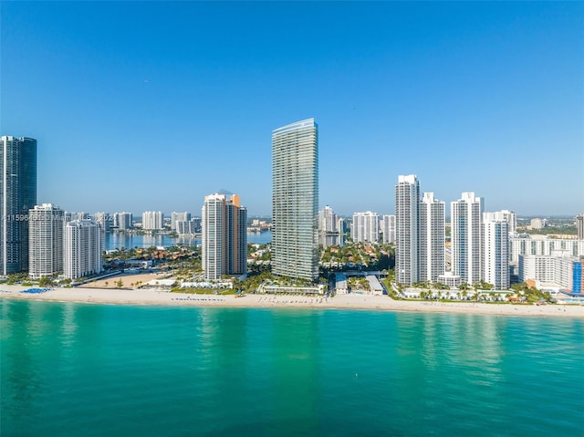 exterior space with a beach view and a water view