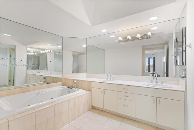 bathroom featuring tile patterned flooring and vanity