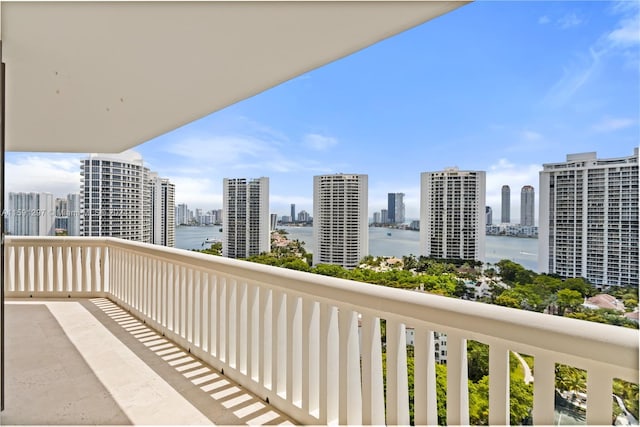 balcony featuring a water view