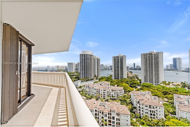 balcony featuring a water view