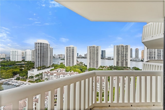 balcony featuring a water view