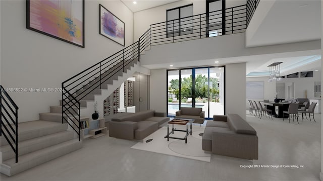 living room with a high ceiling and an inviting chandelier