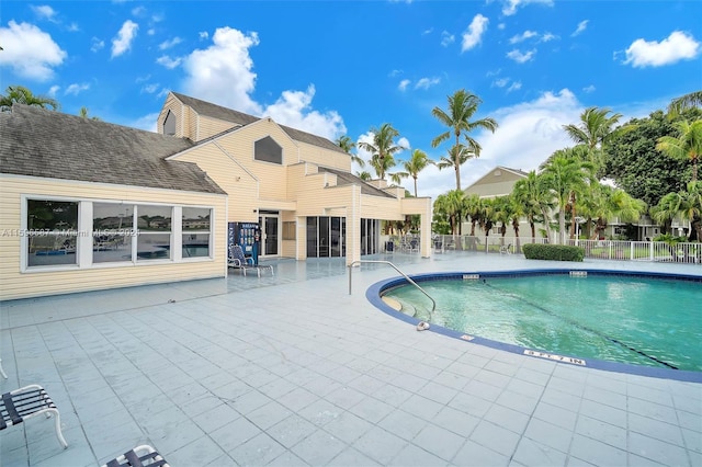 view of swimming pool featuring a patio area