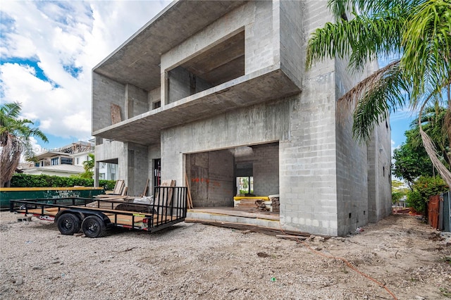 rear view of house with a balcony