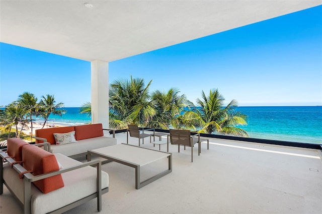 view of patio with an outdoor hangout area and a water view