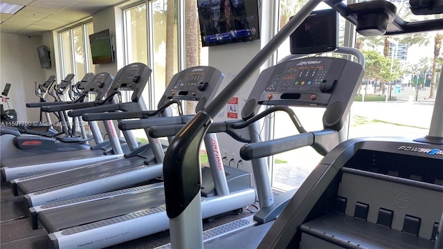 workout area with a drop ceiling