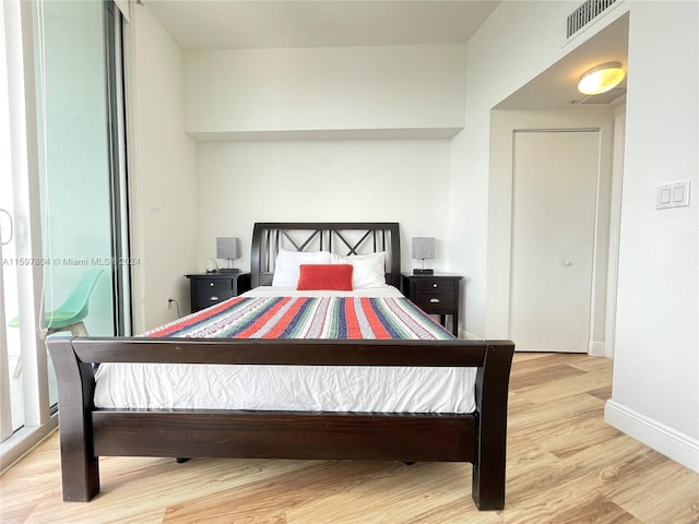 bedroom featuring light hardwood / wood-style floors