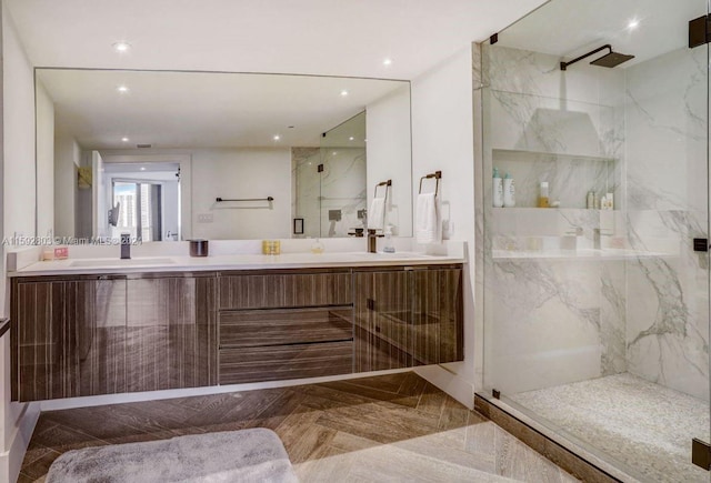 bathroom with vanity and walk in shower