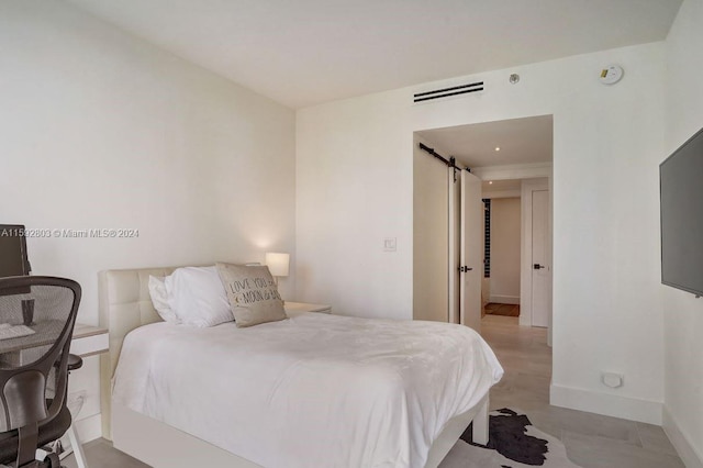 bedroom with a barn door