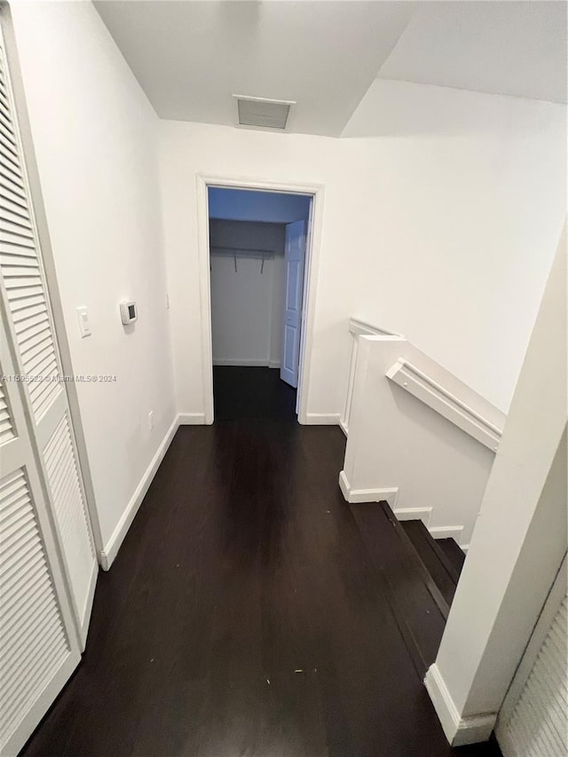 hall featuring dark hardwood / wood-style flooring