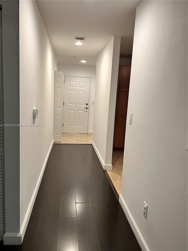 hallway featuring light hardwood / wood-style flooring