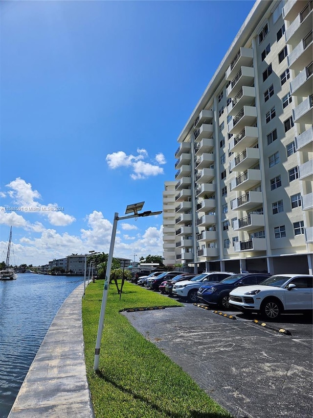 view of building exterior with a water view