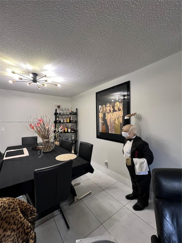 office area featuring a textured ceiling and tile patterned floors