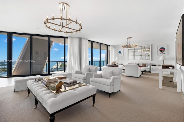 carpeted living room with a wall of windows and an inviting chandelier