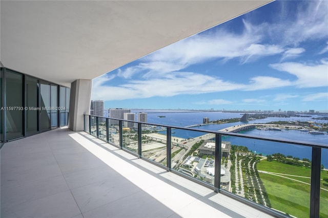 balcony featuring a water view