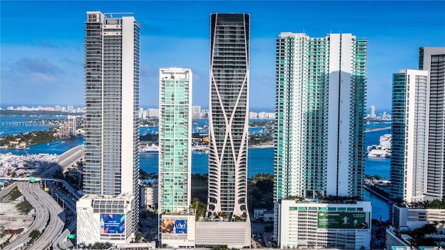 property's view of city with a water view