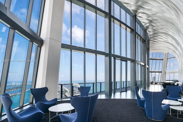 building lobby featuring a water view