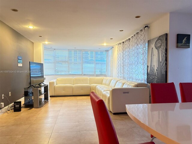 dining space with light tile patterned floors