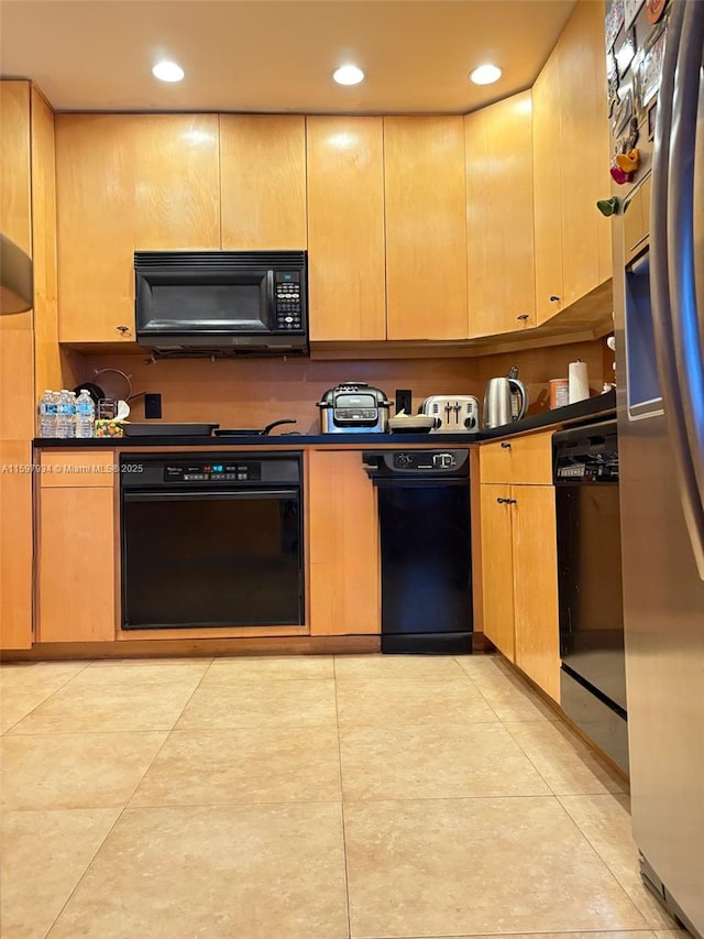 1965 S Ocean Dr Unit 2F, Hallandale Beach, FL 33009 - kitchen with dark countertops, black appliances, recessed lighting, and light tile patterned floors