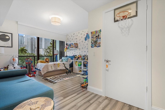 bedroom featuring light hardwood / wood-style floors