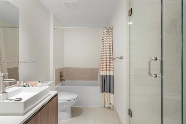 full bathroom with tile patterned floors, vanity, independent shower and bath, and toilet