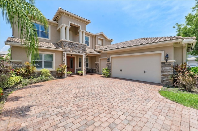 view of front of property featuring a garage