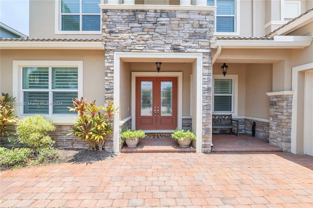 doorway to property featuring french doors