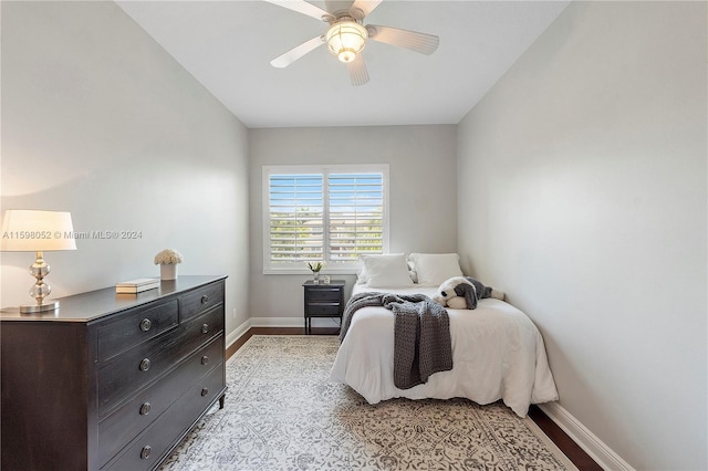 bedroom featuring light hardwood / wood-style floors and ceiling fan