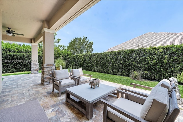 view of patio featuring outdoor lounge area and ceiling fan