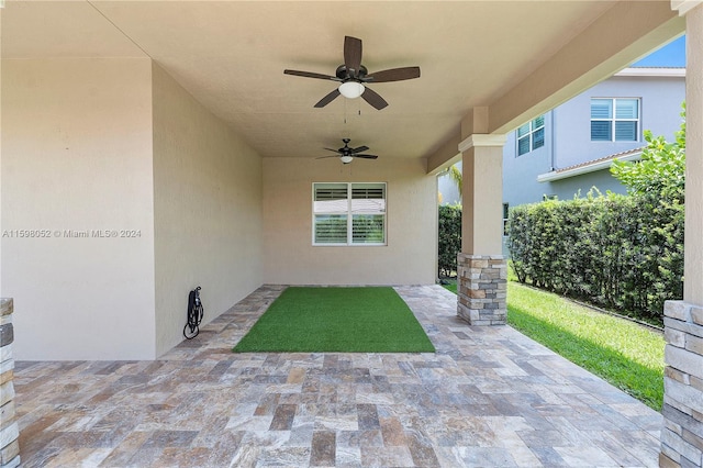 view of patio with ceiling fan