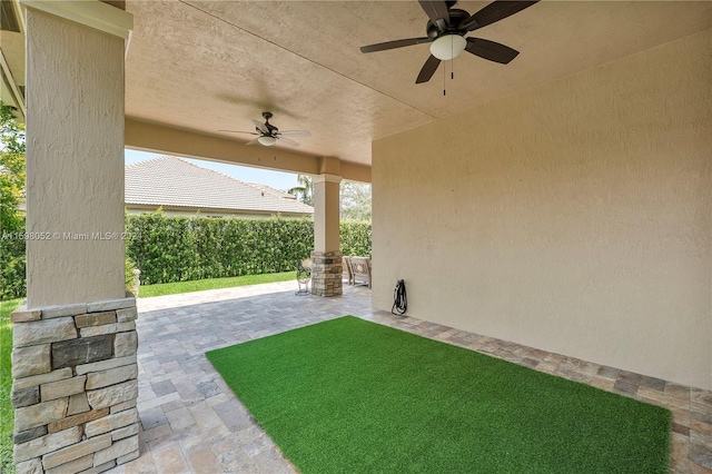 view of patio with ceiling fan