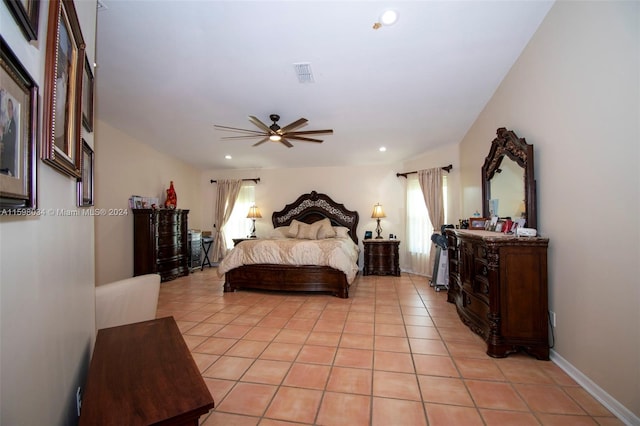 bedroom with light tile patterned floors and ceiling fan