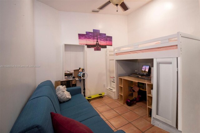 bedroom featuring light tile patterned flooring