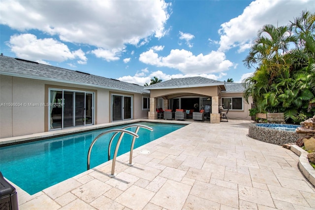 view of pool featuring an outdoor hangout area and a patio area