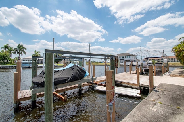 dock area featuring a water view