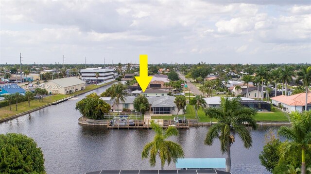 bird's eye view with a water view